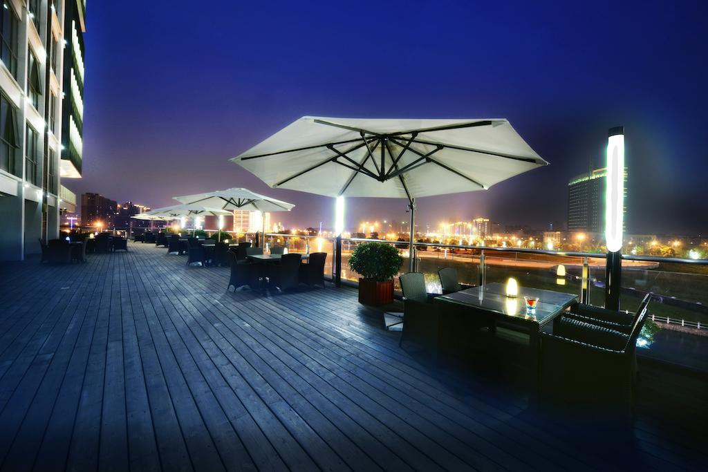 Vienna International Hotel University Town Сучжоу Экстерьер фото